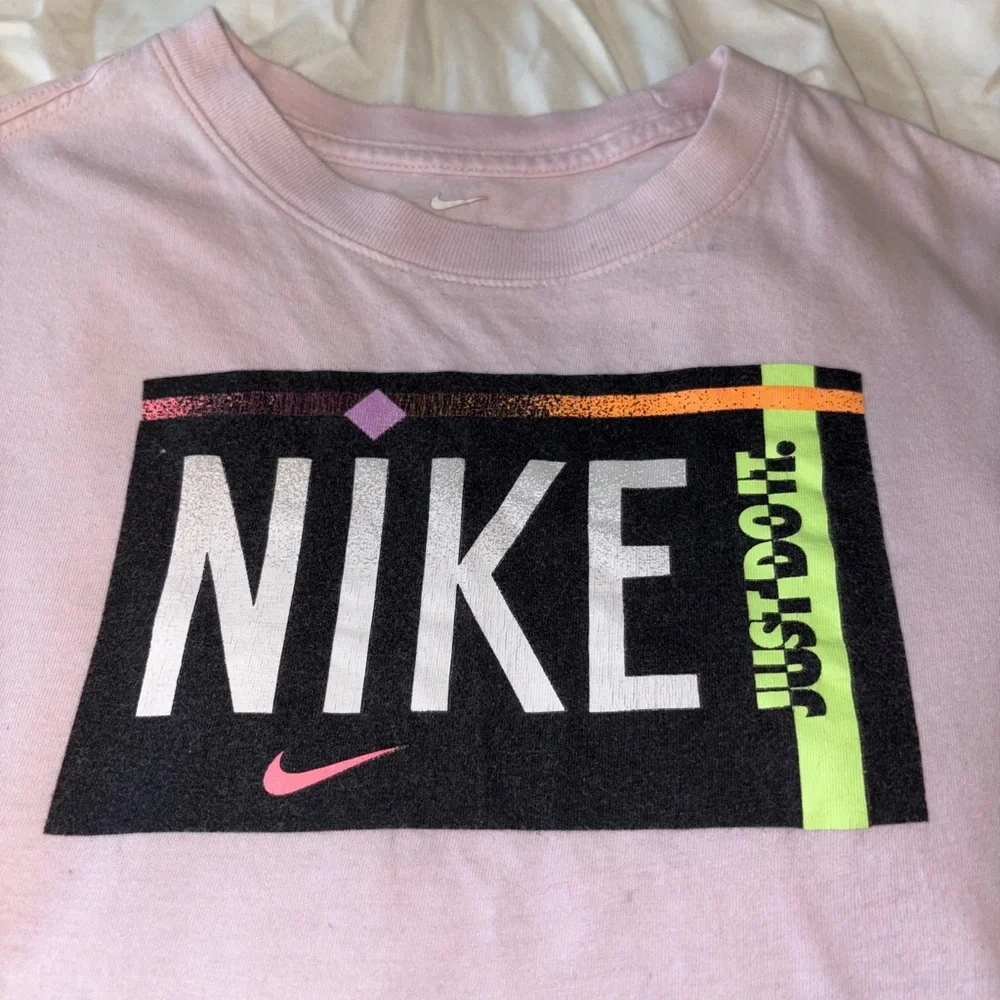 Nike Light Pink Logo Graphic Tee with Neon Accent